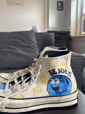 White High-Top Sneaker with Blue Cartoon Earth & Yellow Sunbursts